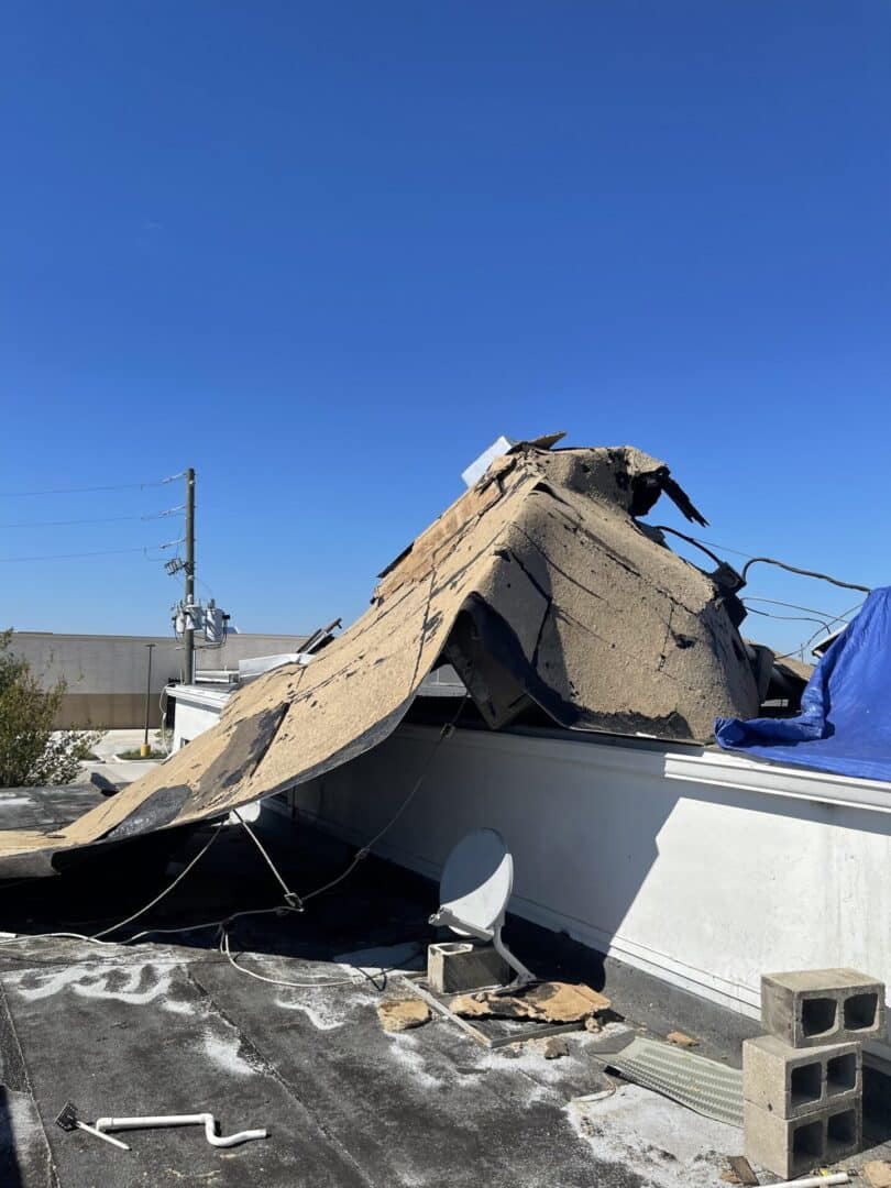 A building that has been torn down and is falling off.