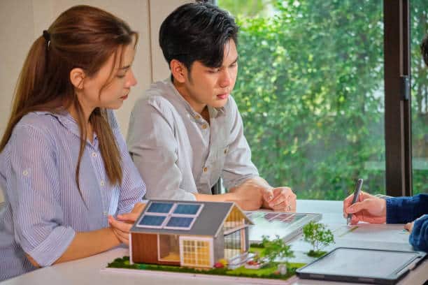 Solar energy sales engineering  Explaining the benefits and functionality residential clean energy credit a solar panel to Asian couple at home ,sustainable living ,energy efficiency, eco-friendly technology ,renewable energy solutions Solar energy sales engineering  Explaining the benefits and functionality  a solar panel to Asian couple at home ,sustainable living ,energy efficiency, eco-friendly technology ,renewable energy solutions Economic And Environmental Benefits of solar panel stock pictures, royalty-free photos & images